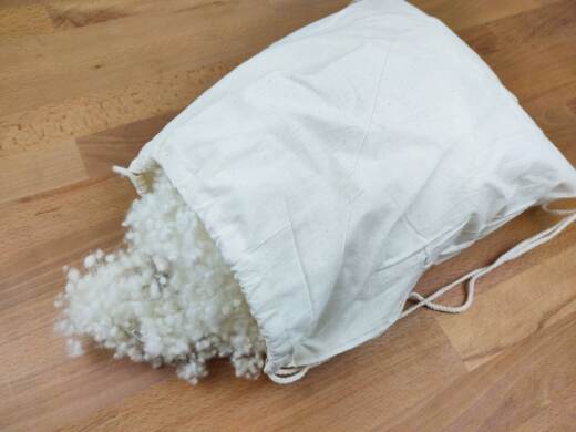 250g Bio Schurwollkügelchen im Biobaumwoll-Turnbeutel