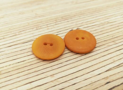 Ein Bio Echt Steinnussknopf (vegan, ST 665) - orange