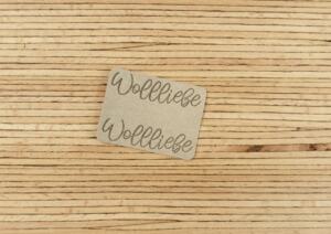 Ein Label zum Einnähen (Seitennaht) - "Wollliebe Wollliebe" -  düne