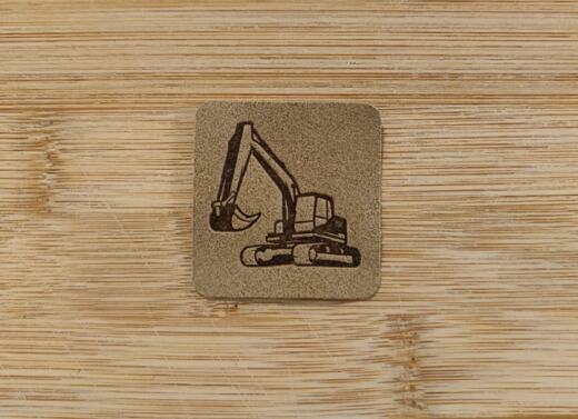 Ein Label zum Aufnähen – Bagger taupe