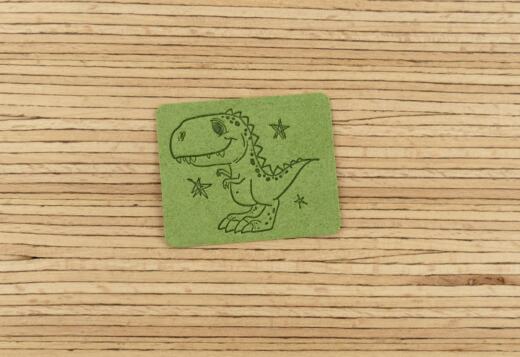 Ein Label zum Aufnähen –  Dinosaurier grün