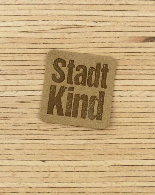 Ein Label zum Aufnähen – "StadtKind" taupe