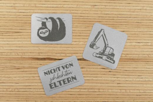 Ein Label zum Aufnähen - Bagger reflektierend (3M™ Scotchlite™)
