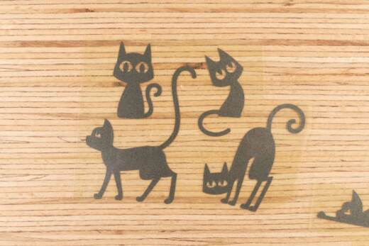 Bügelbilder E21 - schwarz reflektierend - Katzen klein (ca. 9 x 29cm)