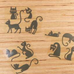 Bügelbilder E21 - schwarz reflektierend - Katzen klein (ca. 9 x 29cm)