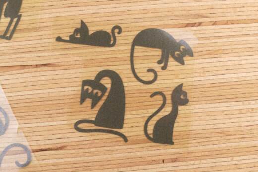 Bügelbilder E21 - schwarz reflektierend - Katzen klein (ca. 9 x 29cm)