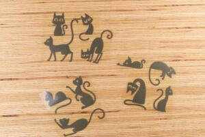 Bügelbilder E21 - schwarz reflektierend - Katzen klein (ca. 9 x 29cm)