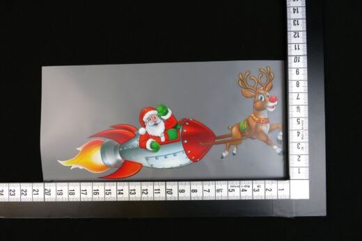 DTF Bügelbild J3 - Tigerlilly EP - Weihnachtsmann & Raketenschlitten (ca. 9,5 x 19cm)